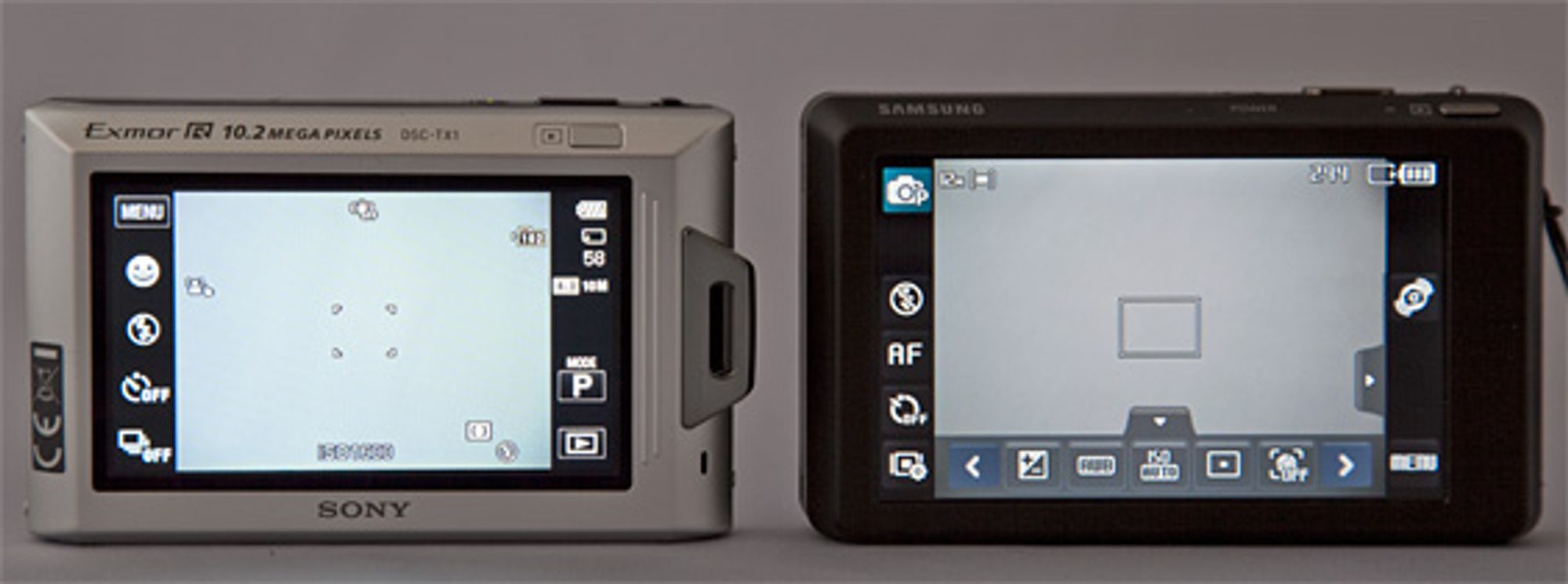 Sony TX1 og Samsung ST550, sistnevnte med lett tilgjengelig hurtigmeny-skuff.