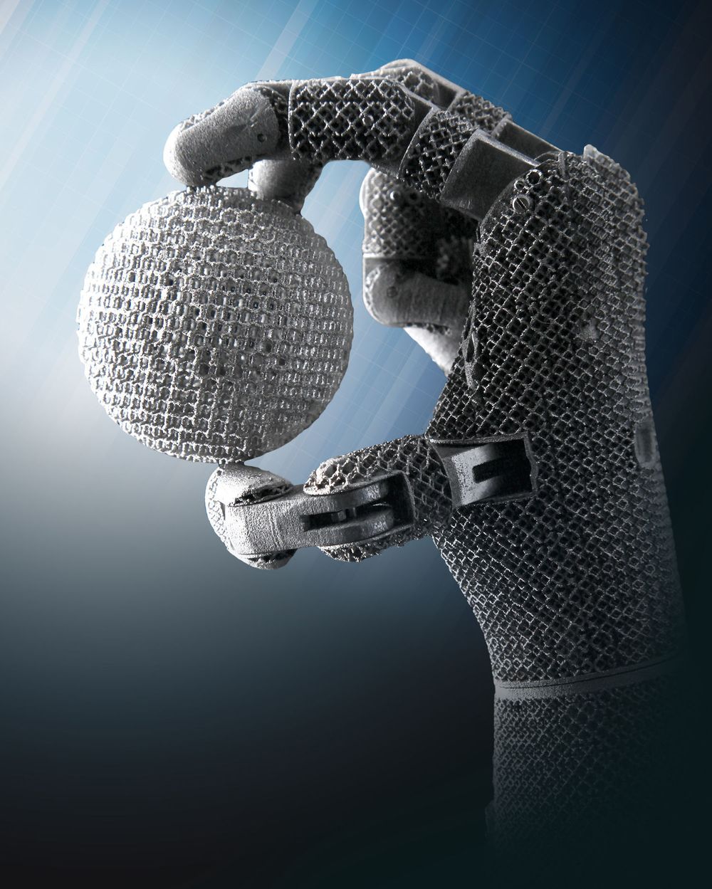 A low-cost lightweight robotic hand based on Additive Manufacturing designed at the Oak Ridge National Laboratories July 12, 2012 in Oak Ridge, TN. The Robotic Hand costs approximately 10 times less than similar devices while commanding 10 times more power than other electric systems. Composed of only 46 parts, this simplified lightweight robotic hand can be manufactured and assembled within 40 hours, and its size can be adjusted based on need.