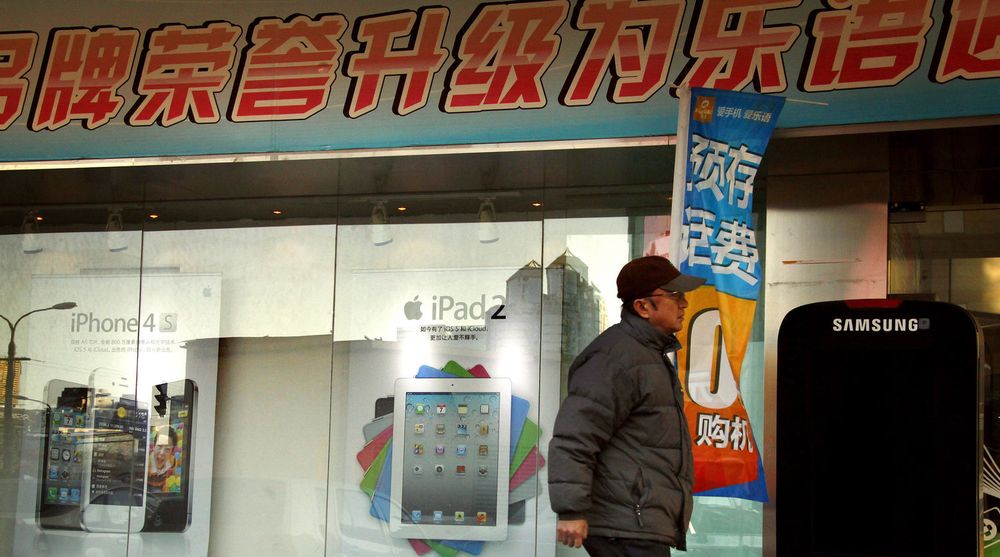 Selv om veksten i Kina er stor er det flere enn forventet som ikke går inn i eletronikk-butikker som denne i Beijing. 