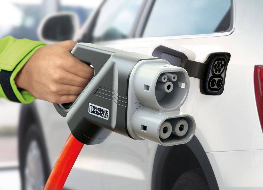 Ladesystem for elektriske kjøretøy som leverer både like- og vekselstrøm.