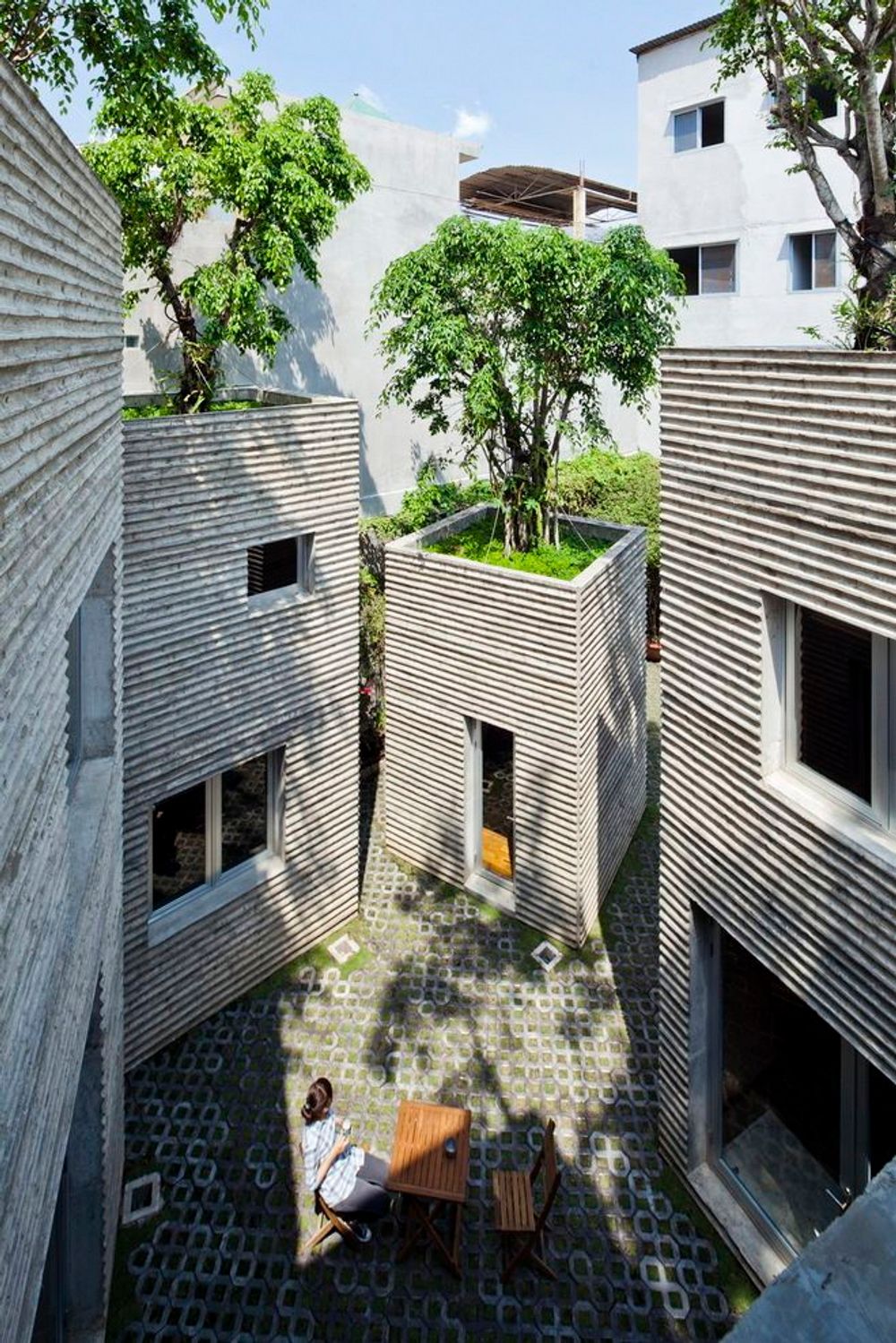 Vo Trong Nghia Architects ønsker å plante trær på takene av bolighus. 