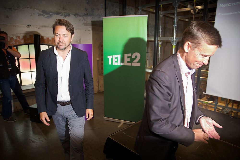 Netcom-sjef August Baumann (til høyre) overtar selskapet til Tele2-sjef Arild Hustad etter at Netcom-eier TeliaSonera blar opp fem milliarder svenske kroner.