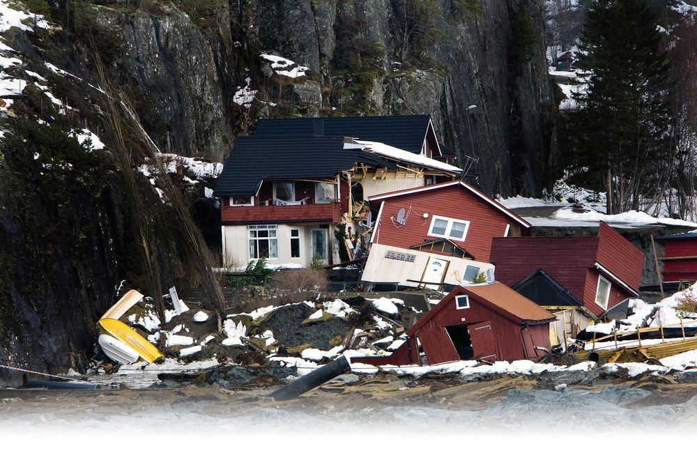 SKRED: Kvikkleireskredet i Kattmarka i Namsos i mars 2009 tok med seg fire hus og seks hytteeiendommer, og ble utløst av fjellsprengning på et veianlegg i sørenden av rasområdet. FOTO: Scanpix