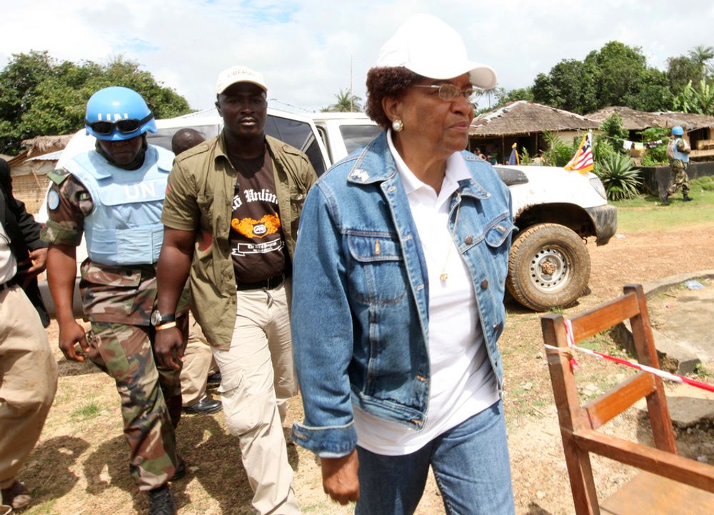 Nobel Peace Prize Laureate Ellen Johnson-Sirleaf, who is also Liberia's president and presidential candidate of the Unity Party (UP), arrives to vote at the polling station in Feefee in Bomi County October 11, 2011.  REUTERS/Luc Gnago (LIBERIA - Tags: POLITICS ELECTIONS)