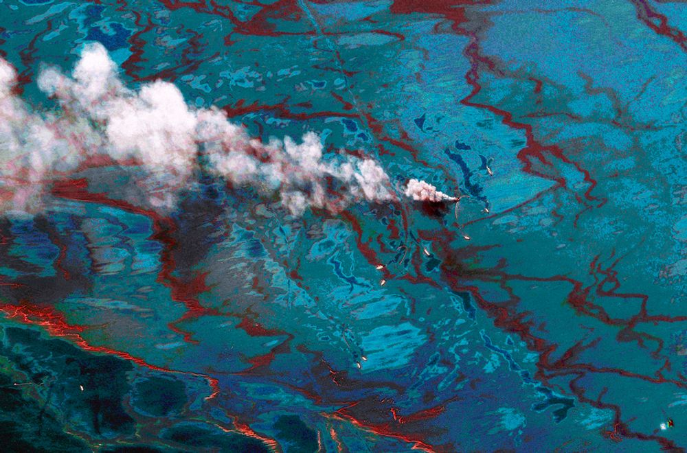 This digitally enhanced satellite image captured by DigitalGlobe on June 15, 2010 and released June 17, 2010 shows the oil spill clean up effort in the Gulf of Mexico. This image leverages the different sensor bands of DigitalGlobe's WorldView-2 satellite to highlight the oil and dispersant