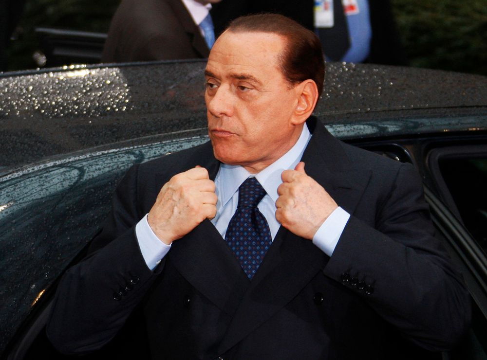 TRUER: Italias statsminister Silvio Berlusconi har truet med veto mot EUs klimamål. Nå sammenlignes han med olje- og energiminister Terje Riis Johansen.