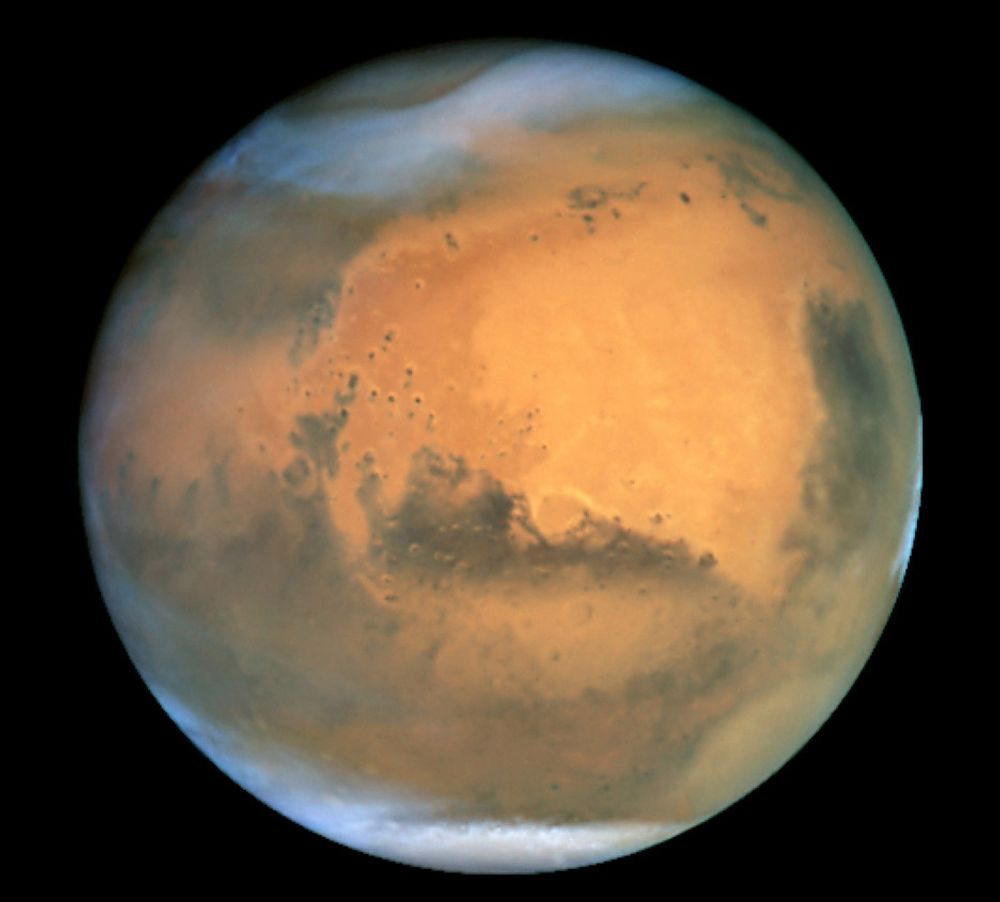 Mars sett gjennom Hubble-teleskopet. Nå vil NASA se på mulighetene for å skape liv på Mars ved å pumpe inn sterke drivhusgasser.
