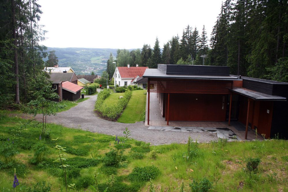 Fremtidshuset er stuet vekk blant hus fra 1900-tallet på Maihaugen på Lillehammer.