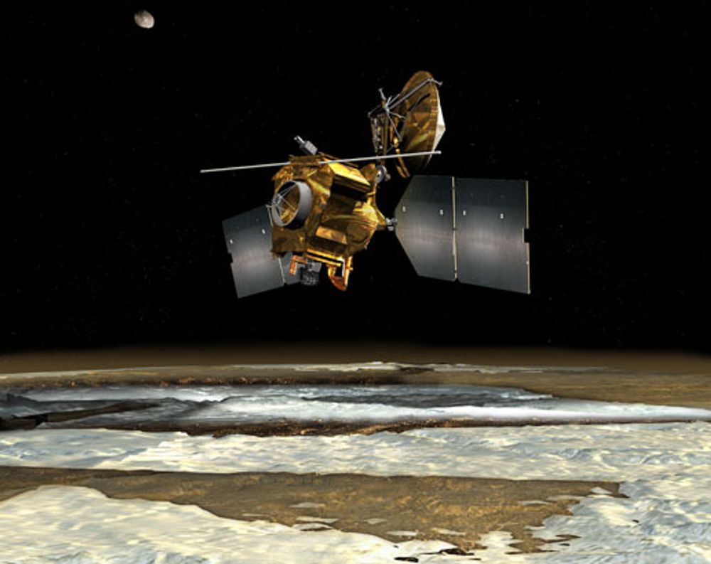 OVER POLEN: Her kretser Orbiter over den ene av Mars¿ poler på jakt etter vann og mineraler, samt en god landingsplass for fremtidige bemannede besøk fra menneskeheten.