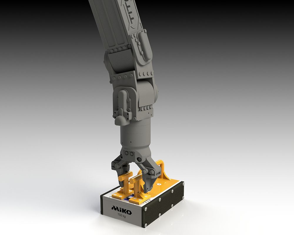 ROV-kloen trykker sammen hendlene for å deaktivere magneten.