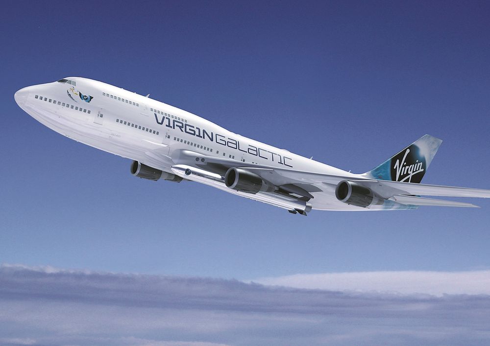 Slik blir Virgin Galatics nye bærefly seende ut med Laucher One under venstre vinge.