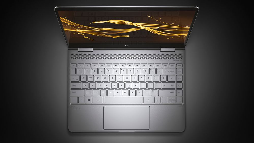 Mens HP Inc kutter i staben fortsetter selskapet å lansere nye produkter, som denne MacBook-konkurrenten kalt Spectre 13.