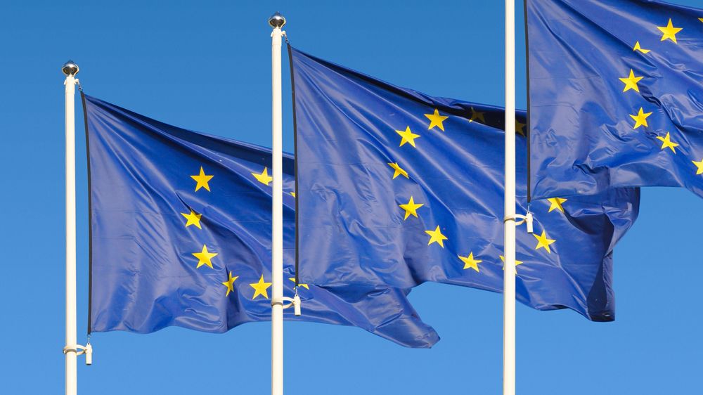 European Union Flags over sky background
