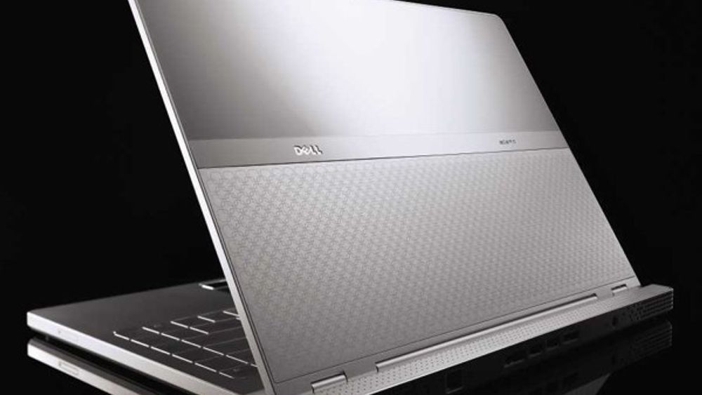 Dells Adamo er tynnere enn Macbook Air, men veier litt mer. Den koster imidlertid flesk.