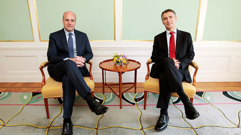 SENKER FORVENTNINGENE: - Jeg tror at vi får en avtale, men her og nå tviler jeg på om det vil være nok til å nå togradersmålet, sier svenskenes statsminister Fredrik Reinfeldt til Berlingske Tidende. Her under et møte med Jens Stoltenberg i sommer.