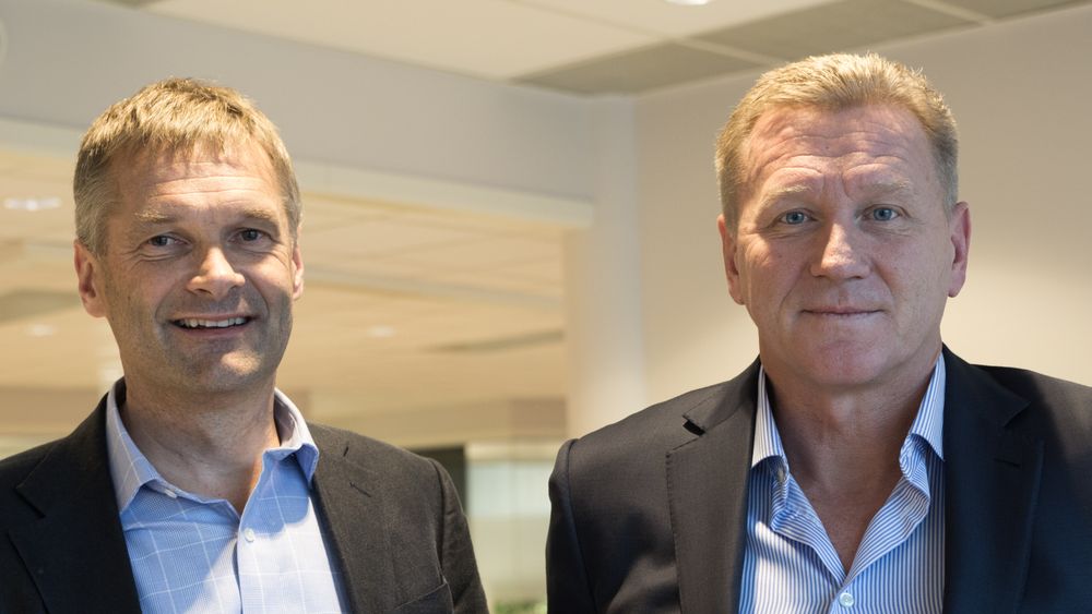 Nå har Telia-sjef Abraham Foss og Phonero-sjef Thore Berthelsen grunn til å smile. Konkurransetilsynet har - uten forbehold - godkjent Telias kjøp av Phonero.