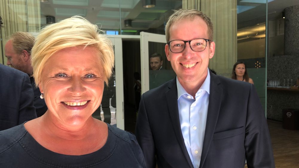  Siv Jensen besøkte Abelia for å fortelle hva hun gjør for at norske ledere skal lykkes. Abelia-sjef Håkon Haugli til høyre.