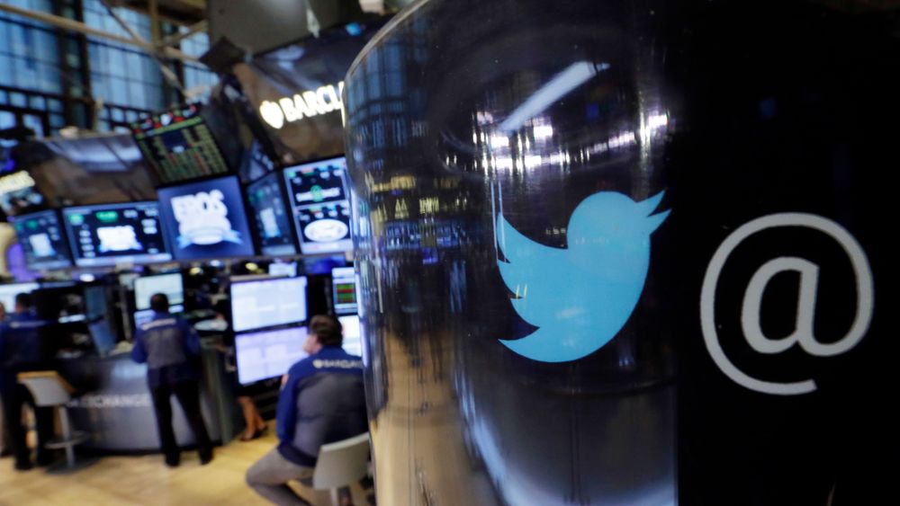 FILE - In this Oct. 13, 2015, file photo, the Twitter logo appears on a phone post on the floor of the New York Stock Exchange. Twitter shares fell Thursday, July 26, 2018, after President Donald Trump said in a tweet the company was limiting visibility of prominent Republicans and said he was going to look into the matter. (AP Photo/Richard Drew, File)