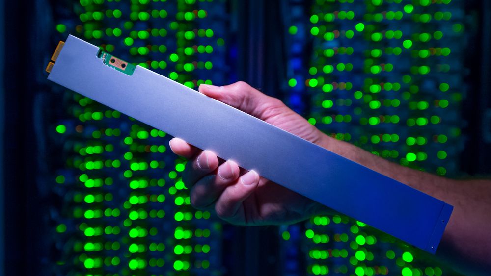 The ruler-shaped PCIe-based QLC Intel SSD D5-P4326 can hold up to 32 terabytes. As part a 1PB solution, it draws just one-tenth the power of a traditional spinning hard drive solution. (Credit: Walden Kirsch/Intel Corporation)
