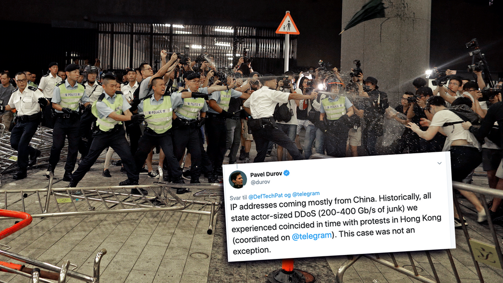 Politifolk i sammenstøt med demonstranter utenfor den lovgivende forsamlingen i Hongkong. Bildet er tatt mandag morgen. Få dager senere ble Telegram, som ble brukt til å organisere protestene, utsatt for et DDoS-angrep fra Kina. 