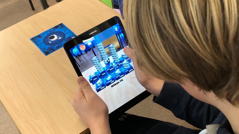 AR-appen skal hjelpe unge å lære mer om økonomi.