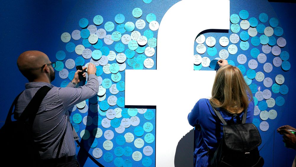 FILE - In this Tuesday, April 30, 2019 file photo, attendees stick notes on a Facebook logo at F8, the Facebook's developer conference, in San Jose, Calif. Facebook lost a legal battle Friday, May 14, 2021 with Ireland's data privacy watchdog over a European Union privacy decision that could result in the social network being forced to stop transferring data to the U.S. The Irish High Court rejected Facebook's bid to block a draft decision by the country's Data Protection Commission to inquire into, and order the suspension of, the company's data flows between the European Union and the U.S. (AP Photo/Tony Avelar, file)