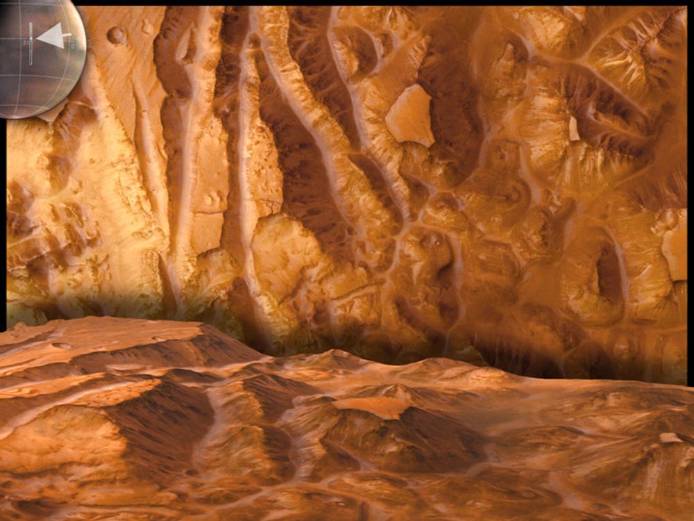 Det første bildet vi fikk fra Europas sonde Mars Express i januar 2004, viste deler av planetens største kløft - Valles Marineris. Bildet viser detaljer med en oppløsning på bare 12 meter. Den nedre delen av bildet viser det samme bildet, men her er stereoinformasjonen brukt av en datamaskin til å forandre perspektivet slik at det ser ut som man flyr i lav høyde over terrenget.