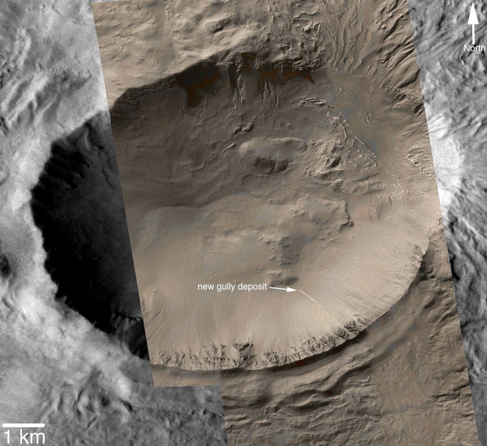 KRATER: Dette bildet viser hele krateret. Hvor vannet har rent er merket med pil.