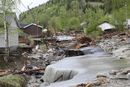 Fra Kvam i Gudbrandsdalen hvor elven Veikleåa raserte et boligområde og E6 i flommen i mai 2013.