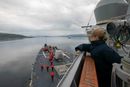 Bildet viser den amerikanske jageren USS Roosevelt som ankommer Tromsø 13. juli 2021. Forfalskede AIS-data viste at skipet befant seg i russisk territorialfarvann to dager senere. Da var det egentlig på øvelse sammen med et norsk marinefartøy utenfor Tromsø.