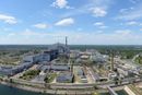 Tsjernobyl-anlegget med den store sarkofagen som er plassert over de ødelagte delene av kraftverket for å hindre stråling.