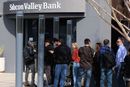 SANTA CLARA, CA, US - MARCH 13: People wait outside the Silicon Valley Bank headquarters in Santa Cl ...
