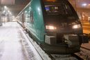 Vy-tog i vintervær på Oslo S.