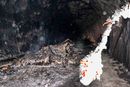 Restene etter tunnelbrann i Brattlitunnelen i Nordland  i 2013 der et vogntog med 27 tonn brunost tok fyr og brant i fire