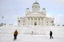People walk on the Senate Square by the Helsinki Cathedral amid cold weather in Helsinki, Finland January 3, 2024.   Lehtikuva/via REUTERS      ATTENTION EDITORS - THIS IMAGE WAS PROVIDED BY A THIRD PARTY. NO THIRD PARTY SALES. NOT FOR USE BY REUTERS THIRD PARTY DISTRIBUTORS. FINLAND OUT. NO COMMERCIAL OR EDITORIAL SALES IN FINLAND.