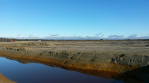  <i>Deponier utenfor kobbergruvene til Pyhäsalmi Mine Oy inneholder svovelkis. Ut fra den kan Yara trekke ut svovel som brukes til fosforsyre til NKPgjødsel.
Foto: Pyhäsalmi Mine Oy</i>