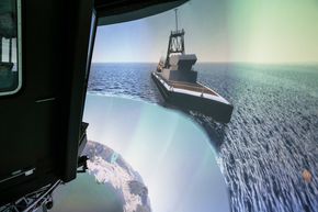 By og hav: Bildet i simulatoren illustrerer godt hovedområdene det jobbes med i simulatorsenteret – smarte byer og maritime løsninger. <i>Foto:  Jørn-Arne Tomasgard</i>