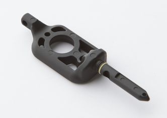 EksportAdapter: For å feste NeoPod til geværet settes et adapter inn i hullet hvor remmen sitter.