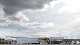 Her sees terminal 3 fra siden, og vingespenn-temaet med tak som skrår ned mot midten.