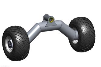 Hjul og aksler: Prototypen har to stive u-formede stålrørsaksler med navmotorer. Begge er hengt opp i et ledd som gjør at de kan tilpasse seg terrenget sideveis. Foto: Svein Olaf Lie