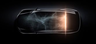 Lucid Motors&#039; eneste bilde hvor man kan se hele bilde avslører svært få detaljer annet enn at sidespeilene ser ut til å være kameraer. Foto: Lucid Motors