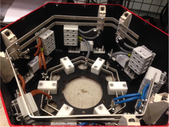 Her ser du innsiden av den trådløst styrte, roterende kraftelektronikkboksen. Foto: Jonas Kristiansen Nøland
