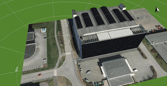 Slik kan bygningen bli seende ut, med sørveggen dekket av solceller og solar trackers på taket.