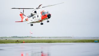 AW101 på Sola i forbindelse med åpningen av den nye basen i juni 2017. Den gang visste ingen at det ville ta tre år før helikoptrene ble tatt i bruk operativt fra denne basen. Foto:  Eirik Helland Urke