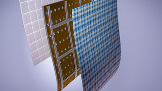 Tre lag: De to ytterlagene er elektrisk ledende tekstil som er laminert sammen med membranlaget i miden. Foto:  Osmotex