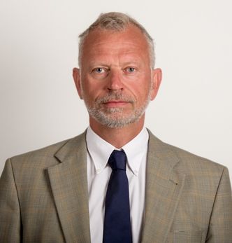 Administrerende direktør for Stiftelsen Lovdata, Odd Storm-Paulsen, mener de konkurrerer på lik linje som andre private aktører når det kommer til rettsavgjørelser. Foto: Kristian Torp