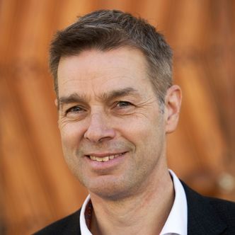 – Dette miljøet er helt unikt, sier Nils Morten Huseby om IFE. Foto:  Sverre Chr. Jarild