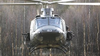 Et Bell 412 SP Gunship på Setermoen med M134 Minigun. Foto:  Torbjørn Kjosvold / Forsvaret