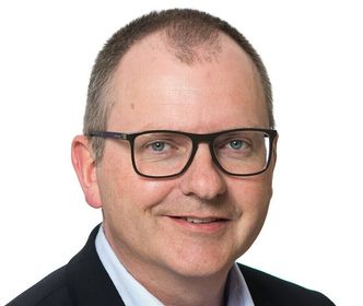 Etter hvert som databelastningen øker, øker også vår avhengighet av kunstig intelligens og maskinlæring, spesielt for å hente ut best mulig verdi fra data, påpeker Per Arne Flatebø. Foto:  Olav Heggø