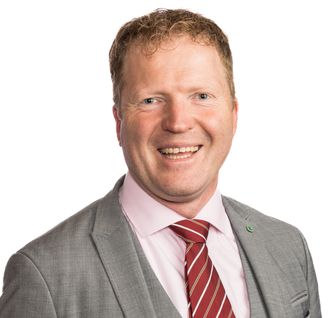 – Vi overtok et stort etterslep etter Høyre-regjeringen, sier Sigbjørn Gjelsvik (Sp), leder for transport- og kommunikasjonskomitéen på Stortinget. Foto: Stortinget